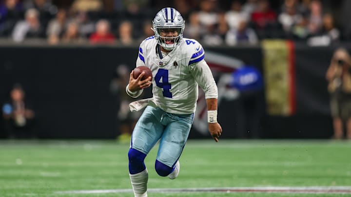 Nov 3, 2024; Atlanta, Georgia, USA; Dallas Cowboys quarterback Dak Prescott (4) scrambles against the Atlanta Falcons in the third quarter at Mercedes-Benz Stadium. Mandatory Credit: Brett Davis-Imagn Images