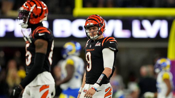 Cincinnati Bengals quarterback Joe Burrow (9) walks off the field after being sacked by Los Angeles Rams defensive tackle Aaron Donald (99) in the fourth quarter during Super Bowl 56, Sunday, Feb. 13, 2022, at SoFi Stadium in Inglewood, Calif. The Cincinnati Bengals lost, 23-20.