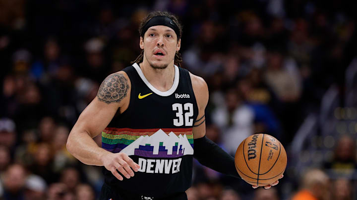 Jan 17, 2026; Denver, Colorado, USA; Denver Nuggets forward Aaron Gordon (32) dribbles the ball up court in the first quarter against the Washington Wizards at Ball Arena. Mandatory Credit: Isaiah J. Downing-Imagn Images