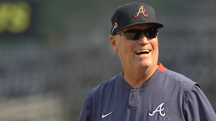 Atlanta Braves manager Brian Snitker (43) reacts during batting practice before the game against the Pittsburgh Pirates at PNC Park.