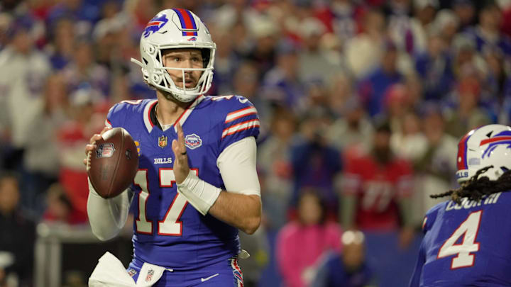 Buffalo Bills quarterback Josh Allen has his eyes on his receiver before throwing the pass during first-half action against the Baltimore Ravens.