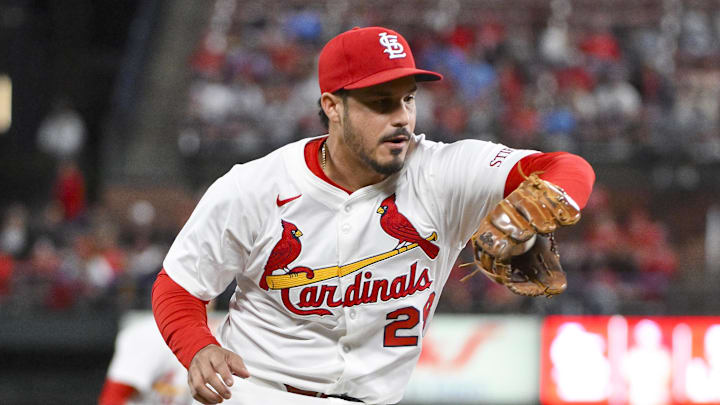 May 6, 2025; St. Louis, Missouri, USA; St. Louis Cardinals third baseman Nolan Arenado (28) fields a ground ball against the Pittsburgh Pirates during the sixth inning at Busch Stadium. Mandatory Credit: Jeff Curry-Imagn Images