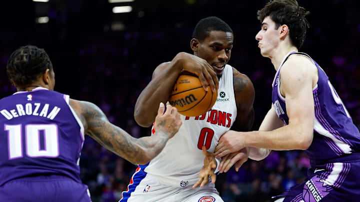 Dec 23, 2025; Sacramento, California, USA; Detroit Pistons center Jalen Duren (0) drives to the basket against Sacramento Kings center Maxime Raynaud (42) during the second quarter at Golden 1 Center. Mandatory Credit: Sergio Estrada-Imagn Images