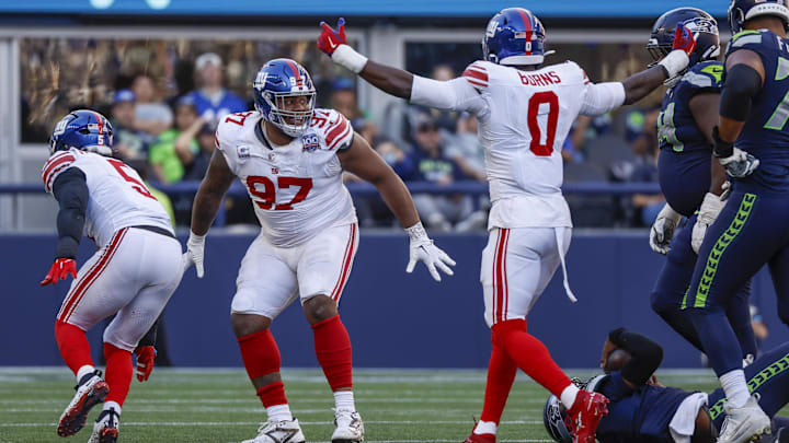 Oct 6, 2024; Seattle, Washington, USA; New York Giants defensive tackle Dexter Lawrence II (97) celebrates following a fourth down sack against the Seattle Seahawks during the fourth quarter at Lumen Field. Oct 6, 2024; Seattle, Washington, USA; New York Giants defensive tackle Dexter Lawrence II (97) celebrates following a fourth down sack against the Seattle Seahawks during the fourth quarter at Lumen Field.