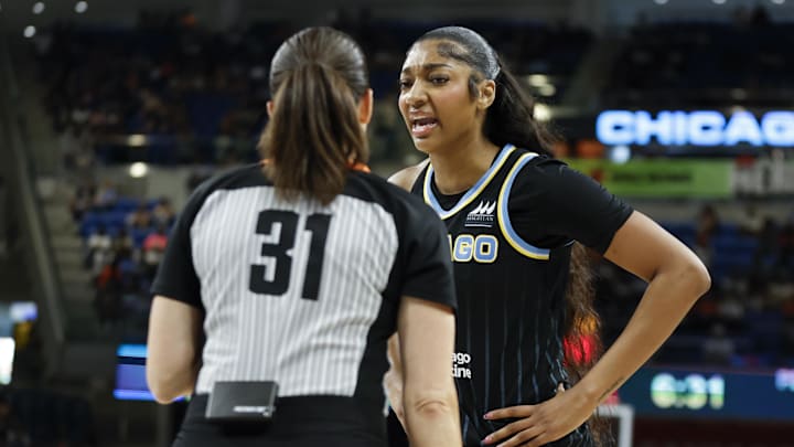 Aug 25, 2024; Chicago, Illinois, USA; Chicago Sky forward Angel Reese (5) talks with official Amy Bonner during the first half of a basketball game against the Las Vegas Aces at Wintrust Arena. Mandatory Credit: Kamil Krzaczynski-Imagn Images