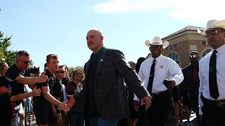 Oct 11, 2025; Lubbock, Texas, USA; Texas Tech Red Raiders head coach Joey McGuire greets fans before the game against the Kansas Jayhawks at Jones AT&T Stadium. Mandatory Credit: Michael C. Johnson-Imagn Images Oct 11, 2025; Lubbock, Texas, USA; Texas Tech Red Raiders head coach Joey McGuire greets fans before the game against the Kansas Jayhawks at Jones AT&T Stadium. Mandatory Credit: Michael C. Johnson-Imagn Images