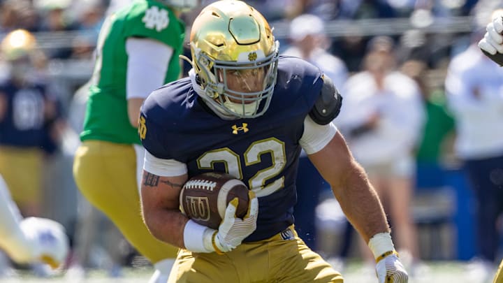Apr 12, 2025; Notre Dame, IN, USA; Notre Dame Fighting Irish running back Aneyas Williams (22) runs the ball during the Blue-Gold game at Notre Dame Stadium. Mandatory Credit: Michael Caterina-Imagn Images1