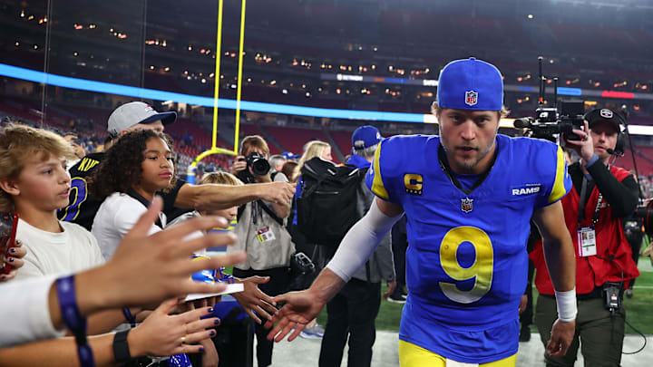 Jan 13, 2025; Glendale, AZ, USA; Los Angeles Rams quarterback Matthew Stafford (9) reacts after the NFC wild card game against the Minnesota Vikings at State Farm Stadium. Mandatory Credit: Mark J. Rebilas-Imagn Images