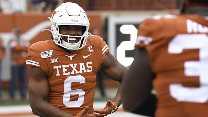 Nov 29, 2019; Austin, TX, USA; Texas Longhorns wide receiver Devin Duvernay (6) celebrates after scoring a touchdown in the first half of the game against the Texas Tech Red Raiders at Darrell K Royal-Texas Memorial Stadium. Mandatory Credit: Scott Wachter-Imagn Images