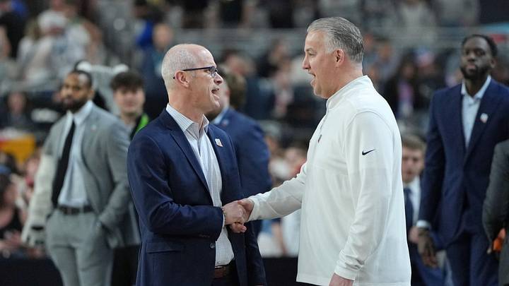 Connecticut Huskies head coach Dan Hurley shakes hands with Purdue Boilermakers head coach Matt Painter. Connecticut Huskies head coach Dan Hurley shakes hands with Purdue Boilermakers head coach Matt Painter.