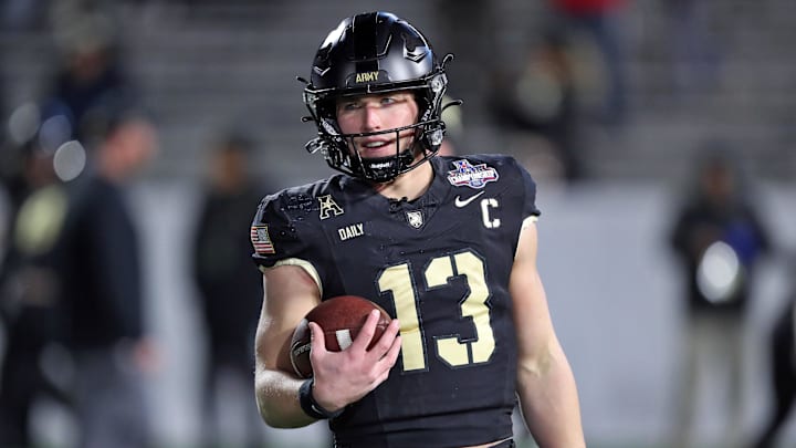 Dec 6, 2024: Army Black Knights quarterback Bryson Daily warms up at Michie Stadium.