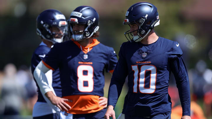 May 23, 2024; Englewood, CO, USA; Denver Broncos quarterback Bo Nix (10) and quarterback Jarrett Stidham (8) during organized team activities at Centura Health Training Center. Mandatory Credit: Isaiah J. Downing-USA TODAY Sports