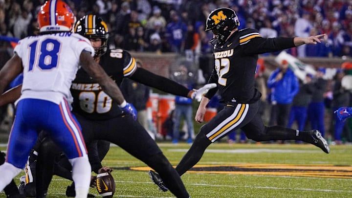 Nov 18, 2023; Columbia, Missouri, USA; Missouri Tigers place kicker Harrison Mevis (92) kicks a field goal against the Florida Gators during the first half at Faurot Field at Memorial Stadium. Mandatory Credit: Denny Medley-Imagn Images