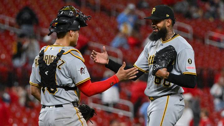 May 20, 2026; St. Louis, Missouri, USA; Pittsburgh Pirates pitcher Dennis Santana (60) celebrates with catcher Endy Rodriguez (13) after the Pirates defeated the St. Louis Cardinals at Busch Stadium. Mandatory Credit: Jeff Curry-Imagn Images