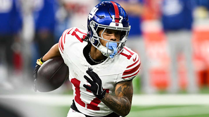 Nov 23, 2025; Detroit, Michigan, USA; New York Giants wide receiver Wan'Dale Robinson (17) runs upfield after catching a swing pass in the second quarter against the Detroit Lions at Ford Field. Mandatory Credit: Lon Horwedel-Imagn Images