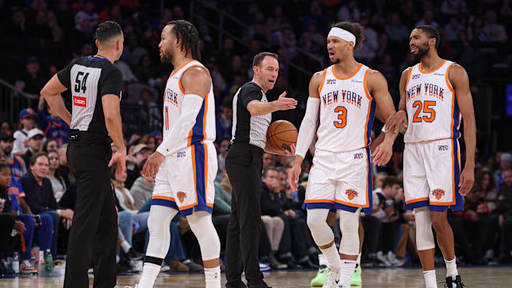 Dec 7, 2024; New York, New York, USA; New York Knicks guard Josh Hart (3) and teammates react after being ejected by referee Ray Acosta (54) during the second half against the Detroit Pistons at Madison Square Garden. Mandatory Credit: Vincent Carchietta-Imagn Images