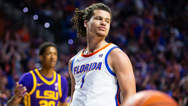 Florida Gators guard Walter Clayton Jr. (1) reacts after his slam dunk in the first half.The Florida