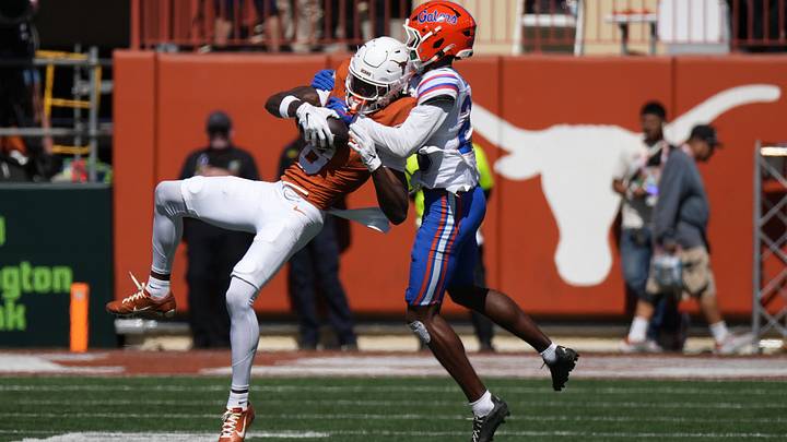 Oct 17, 2026; Austin, Texas, USA;  Texas Longhorns wide receiver Cam Coleman (8) makes a catch while defended by Florida Gators cornerback Cormani McClain (25) during the second half at Darrell K Royal-Texas Memorial Stadium.  Mandatory Credit: Scott Wachter-Imagn Images