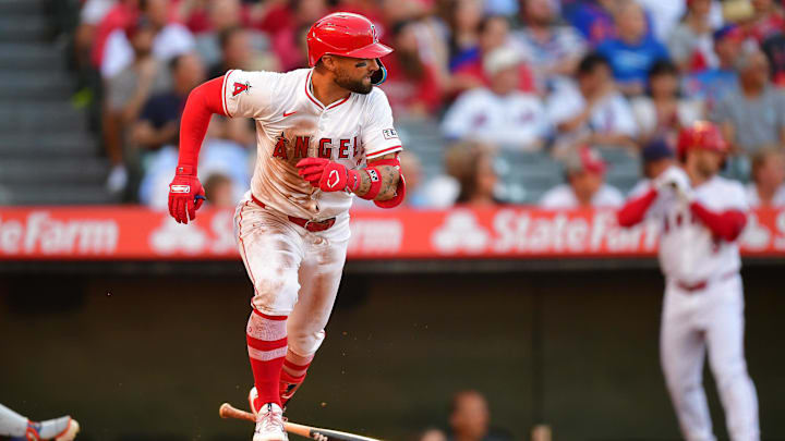 August 3, 2024; Anaheim, California, USA; Los Angeles Angels center fielder Kevin Pillar (12) hits an RBI single against the New York Mets during the first inning at Angel Stadium. Mandatory Credit: Gary A. Vasquez-Imagn Images August 3, 2024; Anaheim, California, USA; Los Angeles Angels center fielder Kevin Pillar (12) hits an RBI single against the New York Mets during the first inning at Angel Stadium. Mandatory Credit: Gary A. Vasquez-Imagn Images