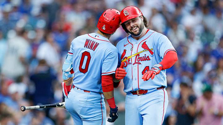 Aug 15, 2026; Chicago, Illinois, USA; St. Louis Cardinals first baseman Alec Burleson (41) celebrates with shortstop Masyn Winn (0) after hitting a solo home run against the Chicago Cubs during the eight inning at Wrigley Field. Mandatory Credit: Kamil Krzaczynski-Imagn Images