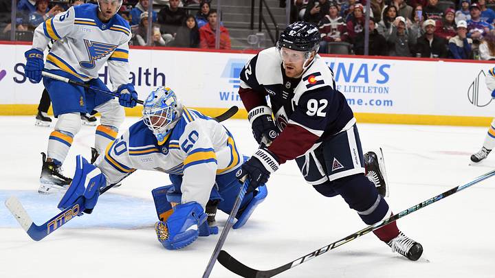 Oct 3, 2026; Denver, Colorado, USA; Colorado Avalanche left winger Gabriel Landeskog (92) works against St. Louis Blues goalie Jordan Binnington (50) for a loose puck during the second period at Ball Arena. Mandatory Credit: Christopher Hanewinckel-Imagn Images