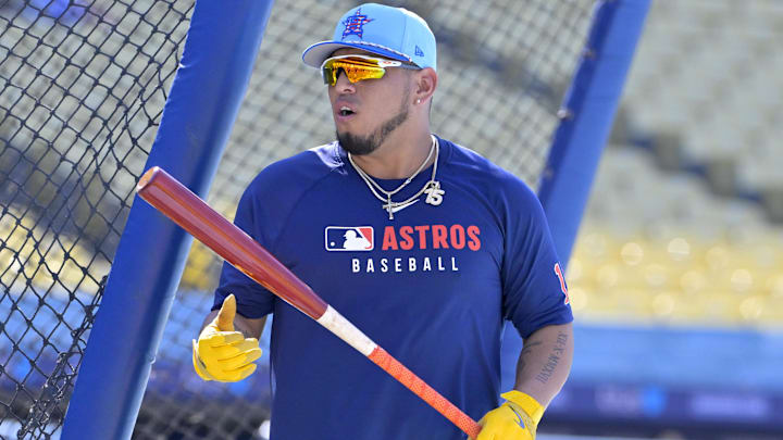 Houston Astros third baseman Isaac Paredes (15) warms up before the game.