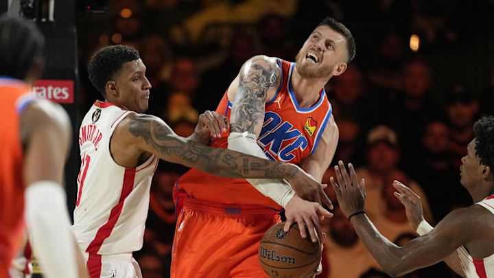 Dec 14, 2024; Las Vegas, Nevada, USA; Houston Rockets forward Jabari Smith Jr. (10) defends against Oklahoma City Thunder center Isaiah Hartenstein (55) during the fourth quarter in a semifinal of the 2024 Emirates NBA Cup at T-Mobile Arena. Mandatory Credit: Kyle Terada-Imagn Images