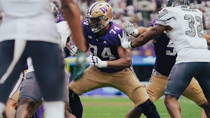 Drew Azzopardi helps form a pocket against Eastern Michigan. Drew Azzopardi helps form a pocket against Eastern Michigan.