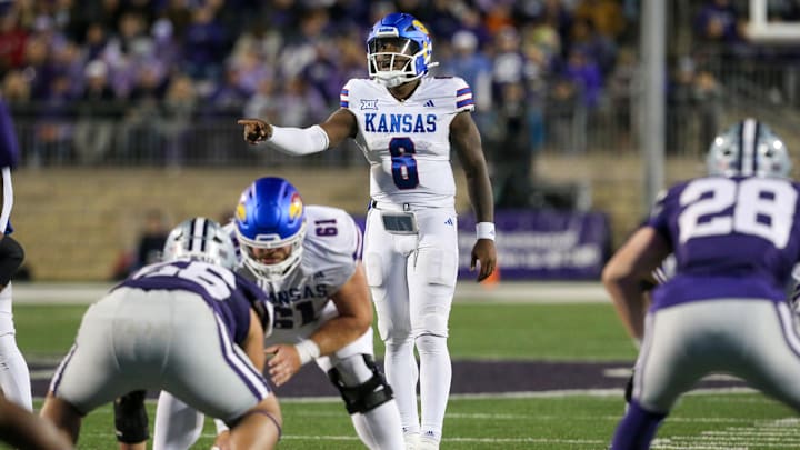 Oct 26, 2024; Manhattan, Kansas, USA; Kansas Jayhawks quarterback Jalon Daniels (6) calls a play during the third quarter against the Kansas State Wildcats at Bill Snyder Family Football Stadium. Mandatory Credit: Scott Sewell-Imagn Images