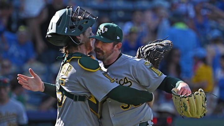 Jun 14, 2025; Kansas City, Missouri, USA; Athletics pitcher Hogan Harris (36) celebrates with catcher Willie Maciver (65) after beating the Kansas City Royals at Kauffman Stadium. Mandatory Credit: Peter Aiken-Imagn Images Jun 14, 2025; Kansas City, Missouri, USA; Athletics pitcher Hogan Harris (36) celebrates with catcher Willie Maciver (65) after beating the Kansas City Royals at Kauffman Stadium. Mandatory Credit: Peter Aiken-Imagn Images