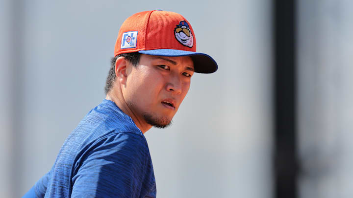 Feb 12, 2025; Port St. Lucie, FL, USA; New York Mets pitcher Kodai Senga (34) looks on during a Spring Training workout at Clover Park. Mandatory Credit: Sam Navarro-Imagn Images