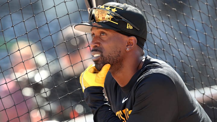 Apr 16, 2025; Pittsburgh, Pennsylvania, USA;  Pittsburgh Pirates right fielder Andrew McCutchen (22) looks on at the batting cage before the game against the Washington Nationals at PNC Park. Mandatory Credit: Charles LeClaire-Imagn Images