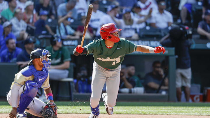 Jul 8, 2023; Seattle, Washington, USA; National League Futures designated hitter Justin Crawford (13) of the Philadelphia Phillies hits an RBI-sacrifice fly against the American League Futures during the second inning of the All Star-Futures Game at T-Mobile Park. 