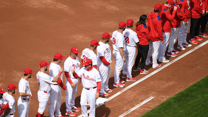 Mar 31, 2025; Philadelphia, Pennsylvania, USA; Philadelphia Phillies manager Rob Thomson (59) greets his players as they lineup before game against the Colorado Rockies at Citizens Bank Park. Mar 31, 2025; Philadelphia, Pennsylvania, USA; Philadelphia Phillies manager Rob Thomson (59) greets his players as they lineup before game against the Colorado Rockies at Citizens Bank Park.