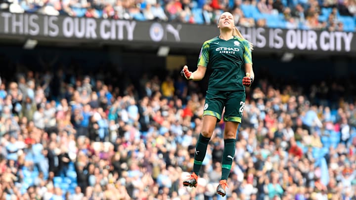 Ellie Roebuck celebrates in the WSL's first ever Manchester derby
