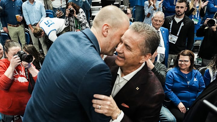 Former UK coach and current Arkansas coach John Calipari hugs Kentucky coach Mark Pope before the game Saturday Feb. 1, 2025 at Rupp Arena in Lexington, Kentucky.