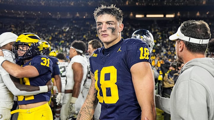 Michigan tight end Colston Loveland (18) walks off the field after 38-17 loss to Oregon at Michigan Stadium in Ann Arbor on Saturday, Nov. 2, 2024. Michigan tight end Colston Loveland (18) walks off the field after 38-17 loss to Oregon at Michigan Stadium in Ann Arbor on Saturday, Nov. 2, 2024.