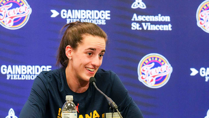 IndyStar sports reporter Chloe Peterson listens to Indiana Fever guard Caitlin Clark (22) answer a question on Friday, Sept. 13, 2024, during a game between the Indiana Fever and the Las Vegas Aces in Indianapolis. The Aces defeated the Fever, 78-74.