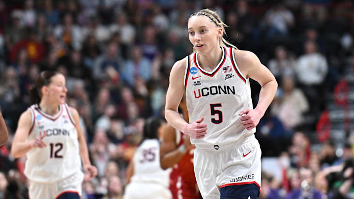 The UConn Huskies and guard Paige Bueckers are favored on Monday.