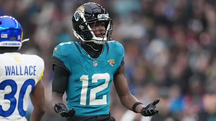 Oct 19, 2025; London, United Kingdom; Jacksonville Jaguars wide receiver Travis Hunter (12) reacts after a play against the Los Angeles Rams during the second half of an NFL International Series game at Wembley Stadium. Mandatory Credit: Kirby Lee-Imagn Images