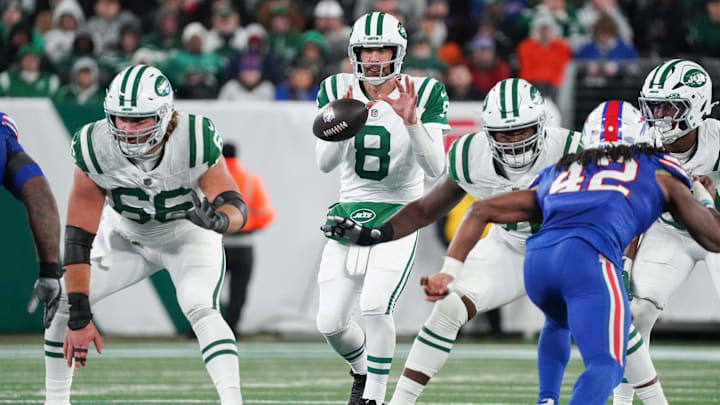 Oct 14, 2024; East Rutherford, New Jersey, USA; New York Jets quarterback Aaron Rodgers (8) receives a snap during the game against the Buffalo Bills at MetLife Stadium. 
