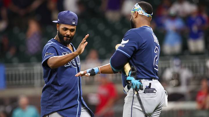 Sep 9, 2026; Atlanta, Georgia, USA; Tampa Bay Rays third baseman Junior Caminero (13) and designated hitter Yandy Diaz (2) celebrate after a victory over the Atlanta Braves at Truist Park. Mandatory Credit: Brett Davis-Imagn Images Sep 9, 2026; Atlanta, Georgia, USA; Tampa Bay Rays third baseman Junior Caminero (13) and designated hitter Yandy Diaz (2) celebrate after a victory over the Atlanta Braves at Truist Park. Mandatory Credit: Brett Davis-Imagn Images