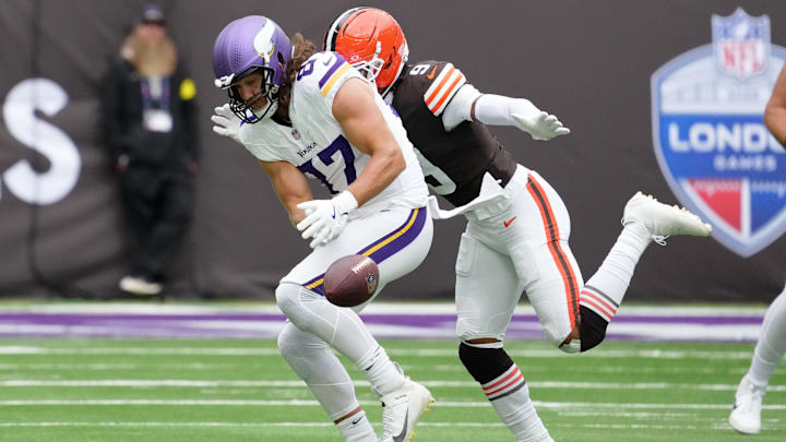 Oct 5, 2025; Tottenham, United Kingdom; Minnesota Vikings tight end T.J. Hockenson (87) is unable to catch the ball while defended by Cleveland Browns safety Grant Delpit (9) during the second quarter of an NFL International Series game at Tottenham Hotspur Stadium.