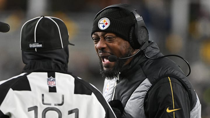 Jan 4, 2025; Pittsburgh, Pennsylvania, USA; Pittsburgh Steelers head coach Mike Tomlin talks with an official against the Cincinnati Bengals during the second quarter at Acrisure Stadium. Mandatory Credit: Barry Reeger-Imagn Images