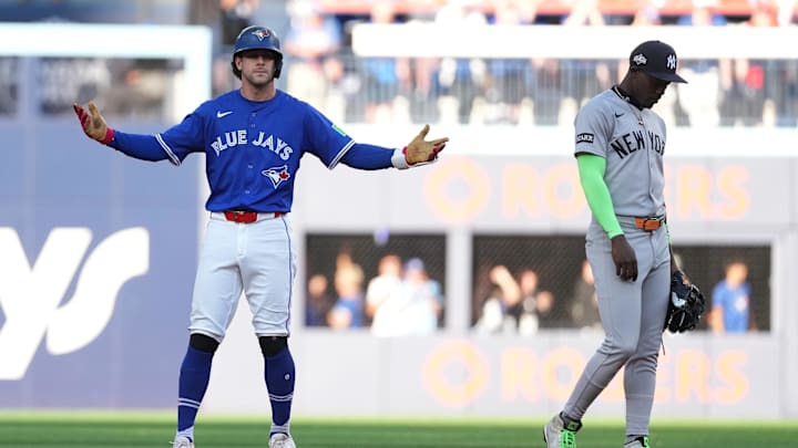 Oct 5, 2025; Toronto, Ontario, CAN; Toronto Blue Jays third baseman Ernie Clement (22) reacts after hitting a double in the third inning against the New York Yankees during game two of the ALDS round for the 2025 MLB playoffs at Rogers Centre. Mandatory Credit: Kevin Sousa-Imagn Images