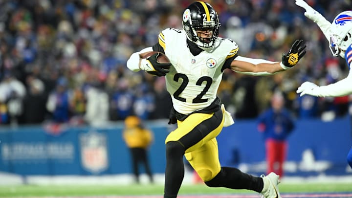 Jan 15, 2024; Orchard Park, New York, USA; Pittsburgh Steelers running back Najee Harris (22) runs the ball in the first half against the Buffalo Bills in a 2024 AFC wild card game at Highmark Stadium. Mandatory Credit: Mark Konezny-USA TODAY Sports