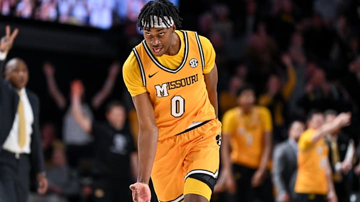 Missouri Tigers guard Anthony Robinson II (0), celebrates after a three-pointer in a game versus the Vanderbilt Commodores this season.