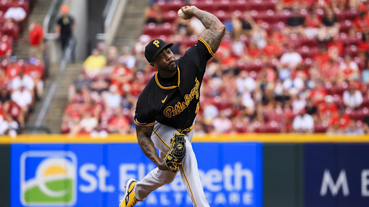 Pittsburgh Pirates relief pitcher Aroldis Chapman (45) pitches against the Cincinnati Reds in the ninth inning at Great American Ball Park. Pittsburgh Pirates relief pitcher Aroldis Chapman (45) pitches against the Cincinnati Reds in the ninth inning at Great American Ball Park.