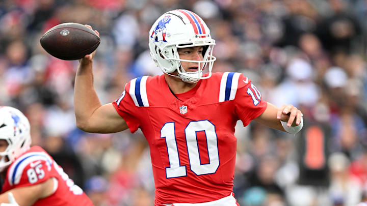 Oct 13, 2024; Foxborough, Massachusetts, USA; New England Patriots quarterback Drake Maye (10) looks to throw against the Houston Texans during the first half at Gillette Stadium.