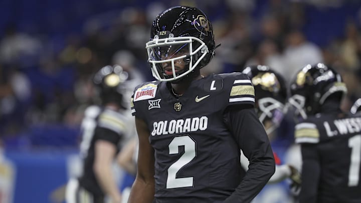 Dec 28, 2024; San Antonio, TX, USA; Colorado Buffaloes quarterback Shedeur Sanders (2) warms up before the game against the Brigham Young Cougars at Alamodome. Mandatory Credit: Troy Taormina-Imagn Images